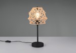 Lampa stołowa Hive z czarną podstawą i kloszem w naturalnym kolorze, wykonanym z plecionki. Ujęcie frontalne, lampa stoi na stole, widoczna żarówka wewnątrz klosza. Kabel z włącznikiem na powierzchni.