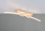 Lampa sufitowa Ginko w kolorze piaskowym, z jedną diodą LED o mocy 18W. Posiada falisty kształt i zamontowaną prostokątną podstawę. Ujęcie z dołu, ukazujące detal wzoru oraz źródło światła. Tło w odcieniach szarości.