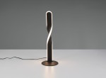 Lampa stołowa Ginko, czarna, z LED o mocy 10W. Ma smukły, spiralny kształt z podświetleniem, stojąca na okrągłej podstawie. W kablu widoczna wtyczka, tło jasne, minimalistyczne. Idealna do nowoczesnych wnętrz.