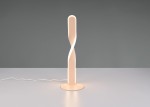 Lampa stołowa Ginko w kolorze piaskowym, z charakterystycznym, skręconym kształtem. Wyposażona w 1 żarówkę LED o mocy 10W. Ustawiona na okrągłej podstawie, z widocznym kablem zasilającym. Tło w odcieniu szarości.