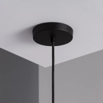 Czarna podstawa lampy wiszącej Rossi-Milano z metalowym mocowaniem, z widocznym przewodem. Lampa przeznaczona do żarówki E27, idealna do nowoczesnych wnętrz. Ujęcie z góry, na tle szarej ściany.