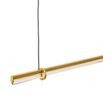 Lampa wisząca Lovely 120 w kolorze złotym, o długości prostokątnej, z przezroczystym kloszem. Zawieszona na czarnym przewodzie, z elementem mocującym w formie pierścienia. Źródło światła LED, moc 11W, barwa 3000K.