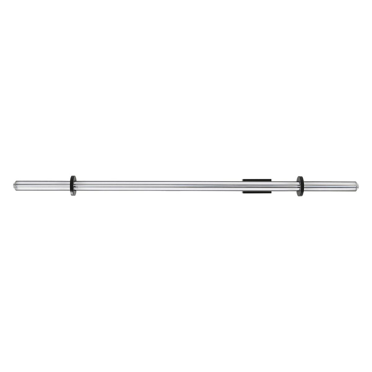 Lampa wisząca LED Lovely 100, czarna, 9W, 3000K. Prosty, cylindryczny kształt z metalowymi akcentami. Ujęcie frontalne, produkt zawieszony, na jednolitym tle. Idealna do nowoczesnych wnętrz, tworzy ciepłe, przyjemne światło.