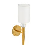 Kinkiet Dama H52 w kolorze złotym z białym kloszem. Okrągła baza i smukły, wygięty uchwyt. Żarówka E14, elegancki design. Produkt zamontowany na ścianie, widok frontalny.