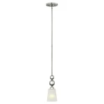 Lampa wisząca Zelda z polerowanego niklu, z pojedynczym kloszem z matowego szkła. Ma długą, prostą rurkę z dekoracyjnymi kulkami. Klosz w kształcie stożka, zawieszony na cienkim przewodzie, idealna do nowoczesnych wnętrz.