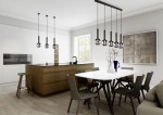 Czarna lampa wisząca Clayton z pięcioma punktami świetlnymi, z minimalistycznym designem. Zawieszona nad białym stołem w nowoczesnej kuchni, z metalowymi kloszami i długimi, czarnymi uchwytami. W tle drewniana wyspa i jasne ściany.