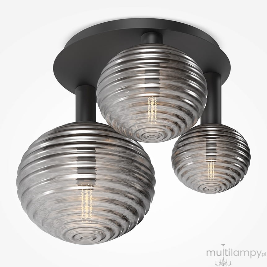 Lampa sufitowa Reels MOD268CL-03B z trzema kloszami E14 w kolorze czarnym. Klosze mają okrągły kształt z dekoracyjnymi, żłobionymi wzorami, wykonane z przezroczystego szkła. Całość zamontowana na prostokątnej podstawie.