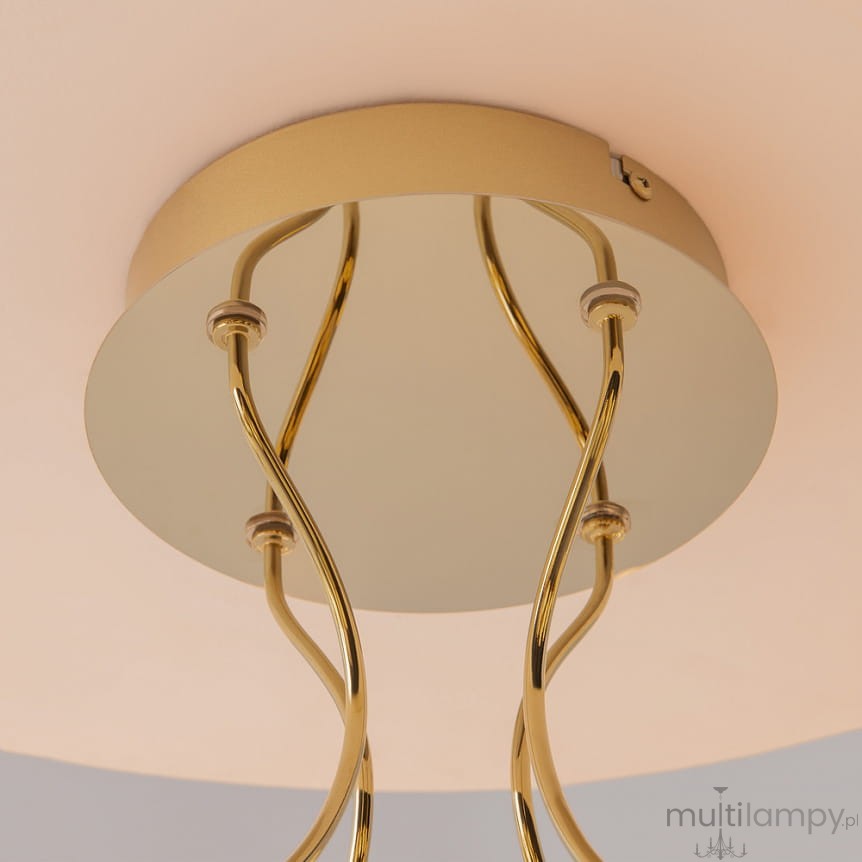 Lampa sufitowa LED Tessara o mocy 72W i temperaturze barwowej 3000K, z okrągłą złotą oprawą i falistymi elementami. Widok od dołu, ukazujący detale konstrukcji oraz materiał wykończenia.