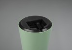 Pistacjowa lampa stołowa Lennon LED z okrągłym korpusem. Widoczny górny panel z czarnym wykończeniem i portem USB do ładowania. Zdjęcie z góry, ukazujące detale konstrukcji.