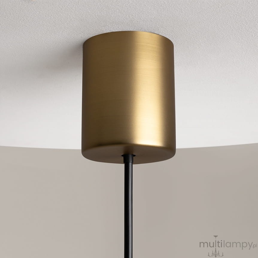 Lampa wisząca LED The Sixth Sense o mocy 7W i temperaturze barwowej 3000K w kolorze mosiądzu. Widziana z bliska, z cylindrycznym kloszem i czarnym przewodem, montowana do sufitu, na tle jasnej powierzchni.