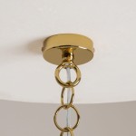 Lampa wisząca Frame MOD174PL-06G z sześcioma miejscami na żarówki E14. Złota, metalowa podsufitka z dekoracyjnymi okrągłymi zawieszkami. Widok z dołu, ukazujący detale mocowania i łańcuchów.