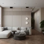 Kinkiet LED Mira o mocy 14W i temperaturze barwowej 3000K w kolorze mosiądzu, zamontowany na ścianie w nowoczesnym wnętrzu. Produkt wyróżnia minimalistyczny design, idealny do oświetlenia przestrzeni mieszkalnych.