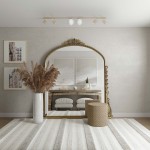 Beżowa lampa sufitowa Aspa z 4 punktami GU10 i 2 punktami G9, zamontowana na gładkim suficie. W tle lustro w ozdobnej ramie, stół z dwoma białymi siedziskami, rośliny w wazonie oraz dekoracyjne elementy na podłodze.