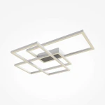 Lampa sufitowa LED Rida z białą obudową, składająca się z kilku prostokątnych ram z podświetleniem, umieszczona w centralnej części. Ujęcie z dołu, na białym tle, eksponuje nowoczesny design i wielowarstwową konstrukcję.