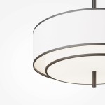 Lampa wisząca Bergamo 5xE27 w kolorze białym i czarnym, z okrągłym kloszem z matowego materiału. Ujęcie z dołu, ukazujące detale konstrukcji i subtelną metalową ramę. Produkt zawieszony, idealny do nowoczesnych wnętrz.