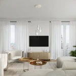 Beżowa lampa stołowa Halo z pojedynczym gniazdem G9, o okrągłej podstawie i minimalistycznym designie. Zestawiona w nowoczesnym wnętrzu, na tle jasnych zasłon i telewizora, podkreślająca elegancki styl aranżacji.