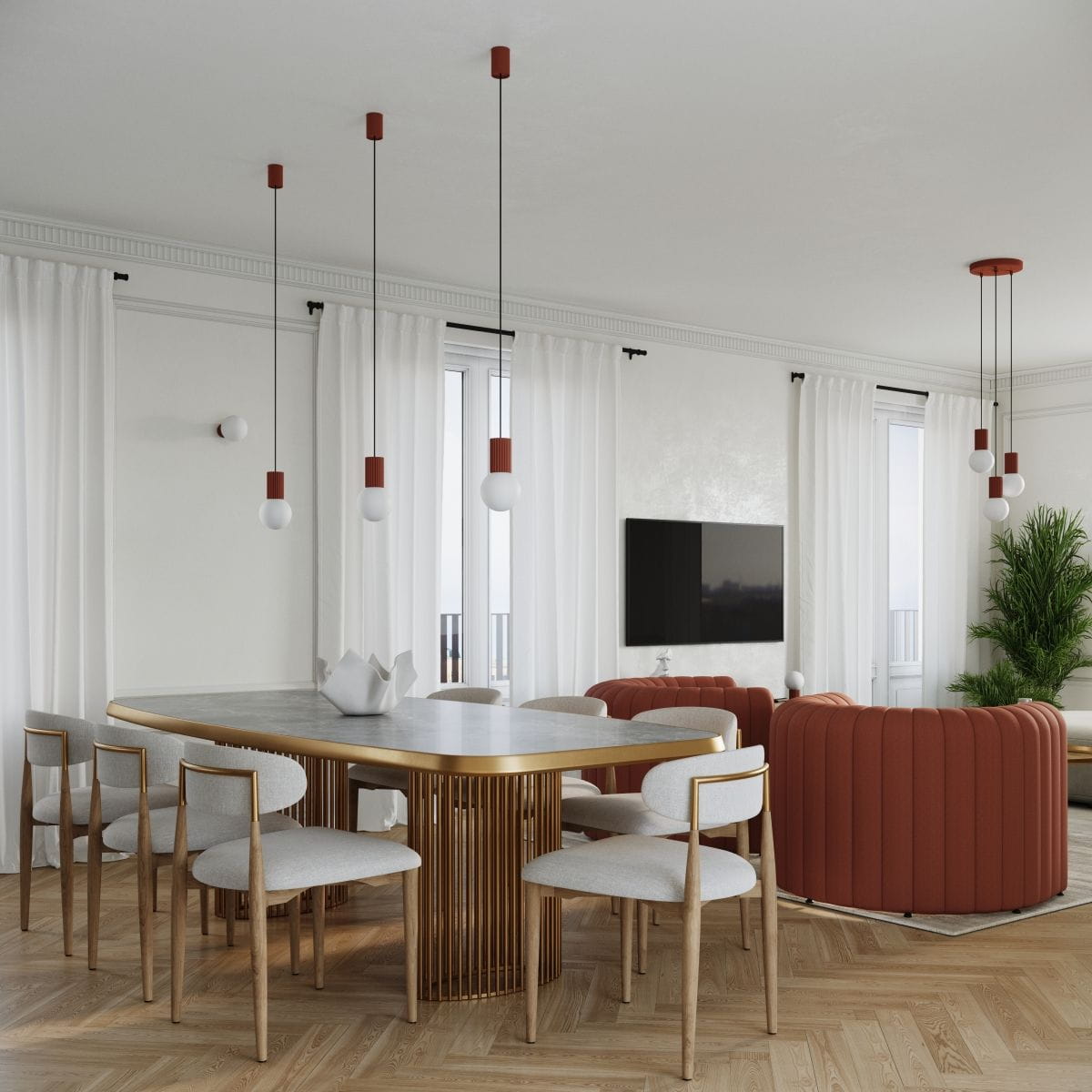 Lampa wisząca Halo 3xG9 w kolorze ochra czerwona, z trzema kulistymi źródłami światła na czarnych przewodach. Zawieszona w nowoczesnym wnętrzu z jasnymi zasłonami, okrągłym stołem i kanapą w podobnym odcieniu.