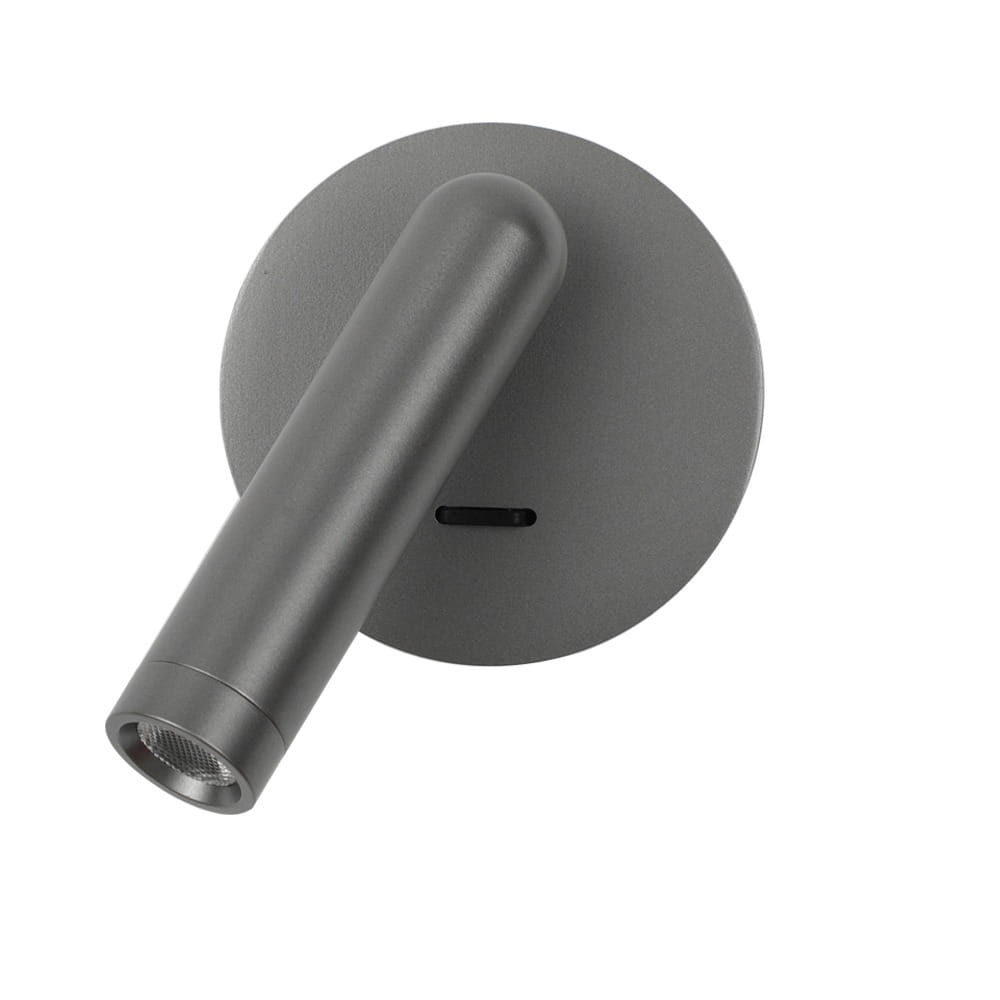 Kinkiet Carda w szarym kolorze z jedną diodą LED 2,5W. Okrągła podstawa z matowego metalu oraz prostokątna lampa z regulowanym kątem świecenia. Prosty, minimalistyczny design, idealny do nowoczesnych wnętrz.