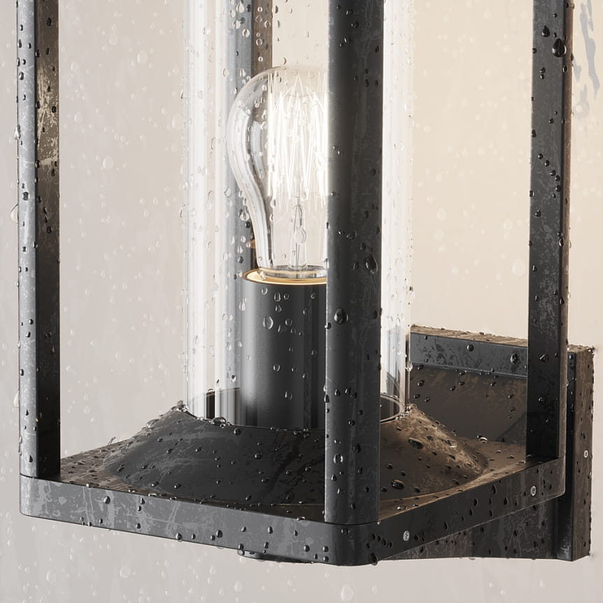 Kinkiet elewacyjny Cell w kolorze grafitowym, z miejscem na żarówkę E27, z przezroczystym kloszem, widoczny w zbliżeniu, z kroplami wody na powierzchni, o prostokątnym kształcie i minimalistycznym designie.