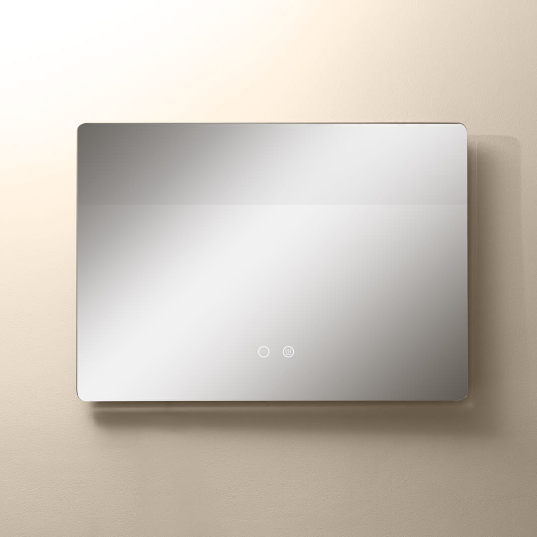 Lustro podświetlane 70x50 cm w kształcie prostokąta, bezramkowe. Posiada dotykowe przyciski do regulacji światła LED CCT. Zawieszone na jasnej ścianie, odbijające otoczenie. Idealne do nowoczesnych łazienek lub przestrzeni.