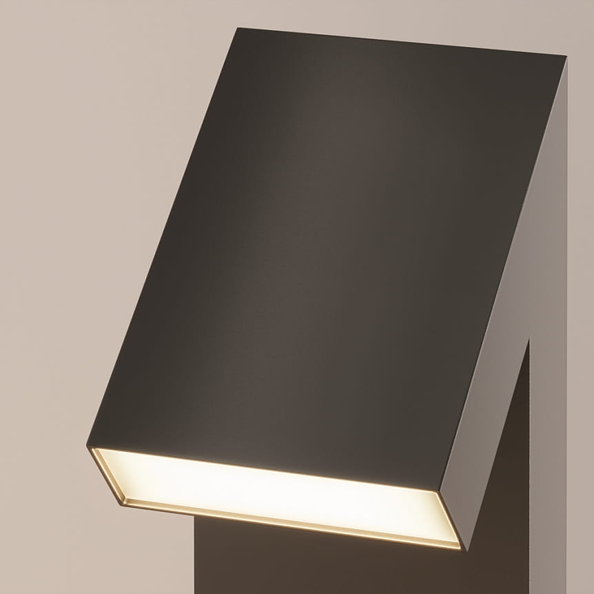 Lampa ogrodowa LED Guss H90 o mocy 15W w kolorze grafitowym. Widok z góry, ukazujący prostokątną głowicę z lekko zaokrąglonymi krawędziami oraz ciepłe białe światło 3000K. Elementy minimalistyczne, wbudowana struktura. Tło jasne, neutralne.