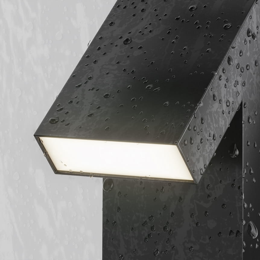 Lampa ogrodowa LED Guss H90, grafitowa, o mocy 15W i barwie 3000K, z prostokątnym kloszem, umieszczona na pionowej podstawie, z widocznymi kroplami wody, co sugeruje odporność na warunki atmosferyczne.