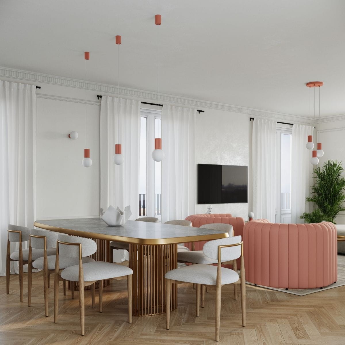 Lampa wisząca Halo 3xG9 w brzoskwiniowym kolorze, zawieszona na długich kablach, z białymi kulistymi kloszami. Ujęcie z dołu, w nowoczesnym wnętrzu z meblami w odcieniach brzoskwiniowych i drewnianymi detalami.