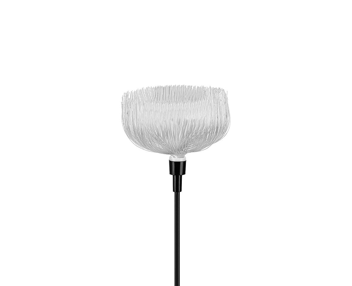 Lampa solarna ogrodowa w kształcie kwiatu, z przezroczystym kloszem z cienkich włókien, umocowana na czarnym stalowym stelażu. Widoczna długość 75 cm, lampa wbijana w ziemię, idealna do dekoracji ogrodu.