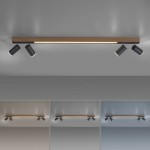 Listwa sufitowa Pure Lines w kolorze ciemnego drewna, z trzema ruchomymi reflektorami LED (5xLED, 25W). Ujęcie frontalne, zamontowana na suficie, podkreślająca nowoczesny design. Widoczny pilot do zdalnego sterowania.