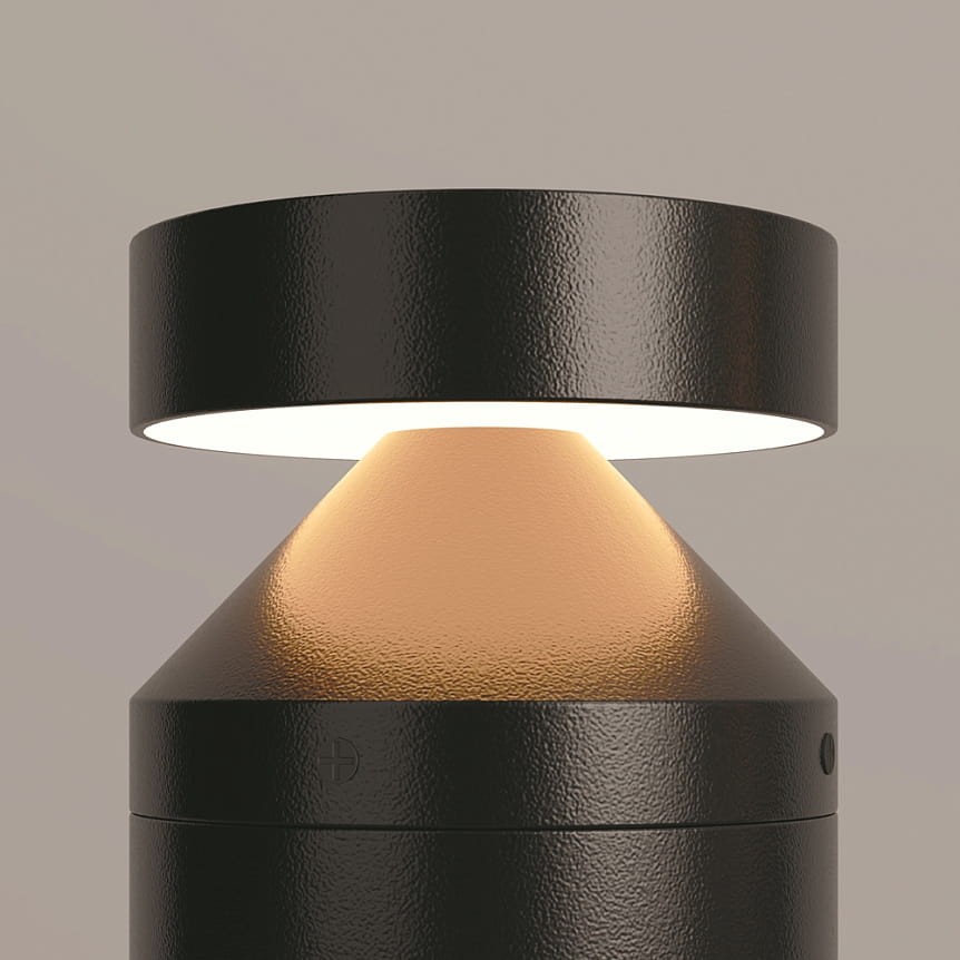 Olten H30 lampa ogrodowa LED 12W 3000K w kolorze grafitowym, o kształcie stożkowym z okrągłym kloszem. Ujęcie z bliska, z widoczną fakturą obudowy, emitująca ciepłe światło. Idealna do oświetlenia przestrzeni zewnętrznych.