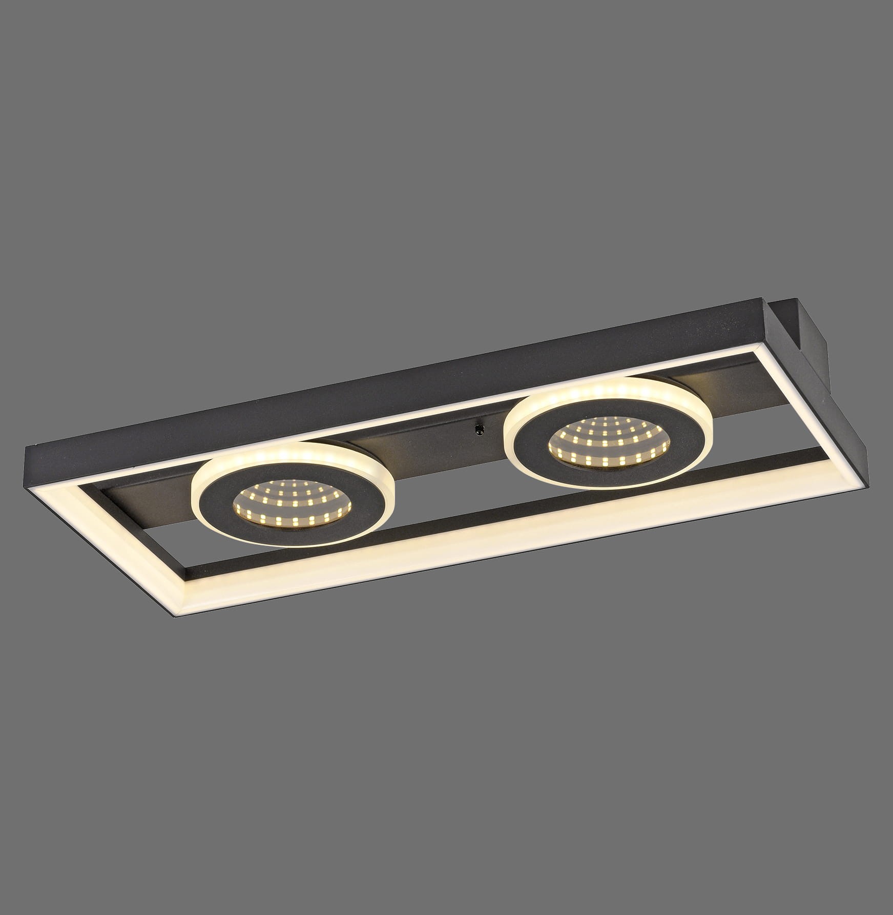 Lampa sufitowa Traforo z pilotem LED 20W CCT w kolorze czarnym, o prostokątnym kształcie, z dwoma okrągłymi źródłami światła. Wykończenie matowe, z delikatnym podświetleniem. Montaż sufitowy, widok z góry.