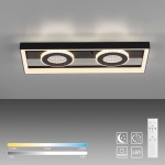 Lampa sufitowa Traforo LED 20W CCT w kolorze czarnym, z dwoma okrągłymi kloszami i podświetleniem. Zdalne sterowanie pilotem, możliwość regulacji temperatury barwowej (2700K-5000K) oraz intensywności światła. Ujęcie z góry.