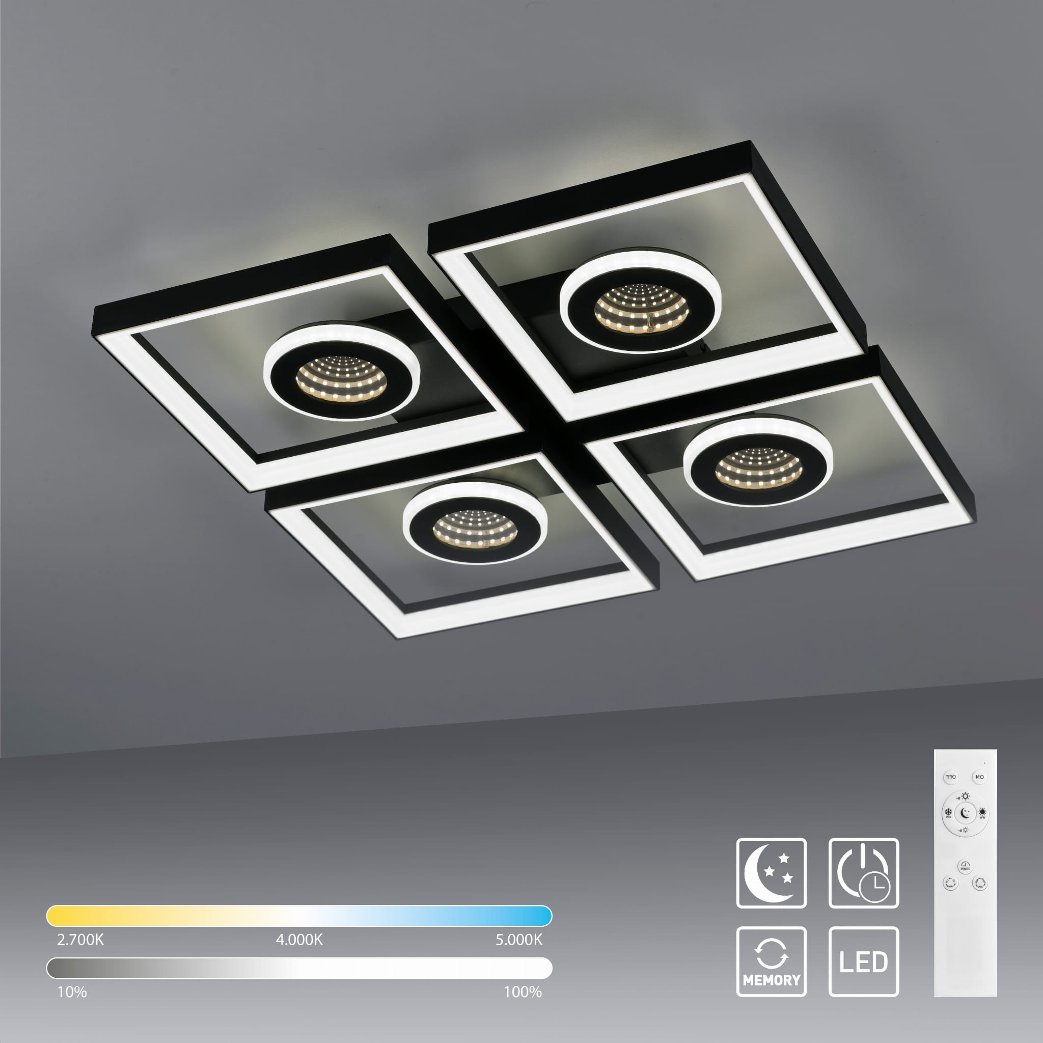Lampa sufitowa Traforo z pilotem, LED 35W CCT, w kolorze czarnym. Składa się z czterech prostokątnych ram, z okrągłymi źródłami światła. Widoczny pilot z przyciskami do regulacji temperatury barwowej i jasności. Ujęcie z dołu, na szarym tle.