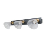Kinkiet Orella z trzema reflektorami LED 12W w kolorze czarnym i złotym. Szklane klosze o teksturowanej powierzchni, zamontowane na prostokątnej, ciemnej podstawie. Reflektory ustawione w linii, skierowane w różne strony.