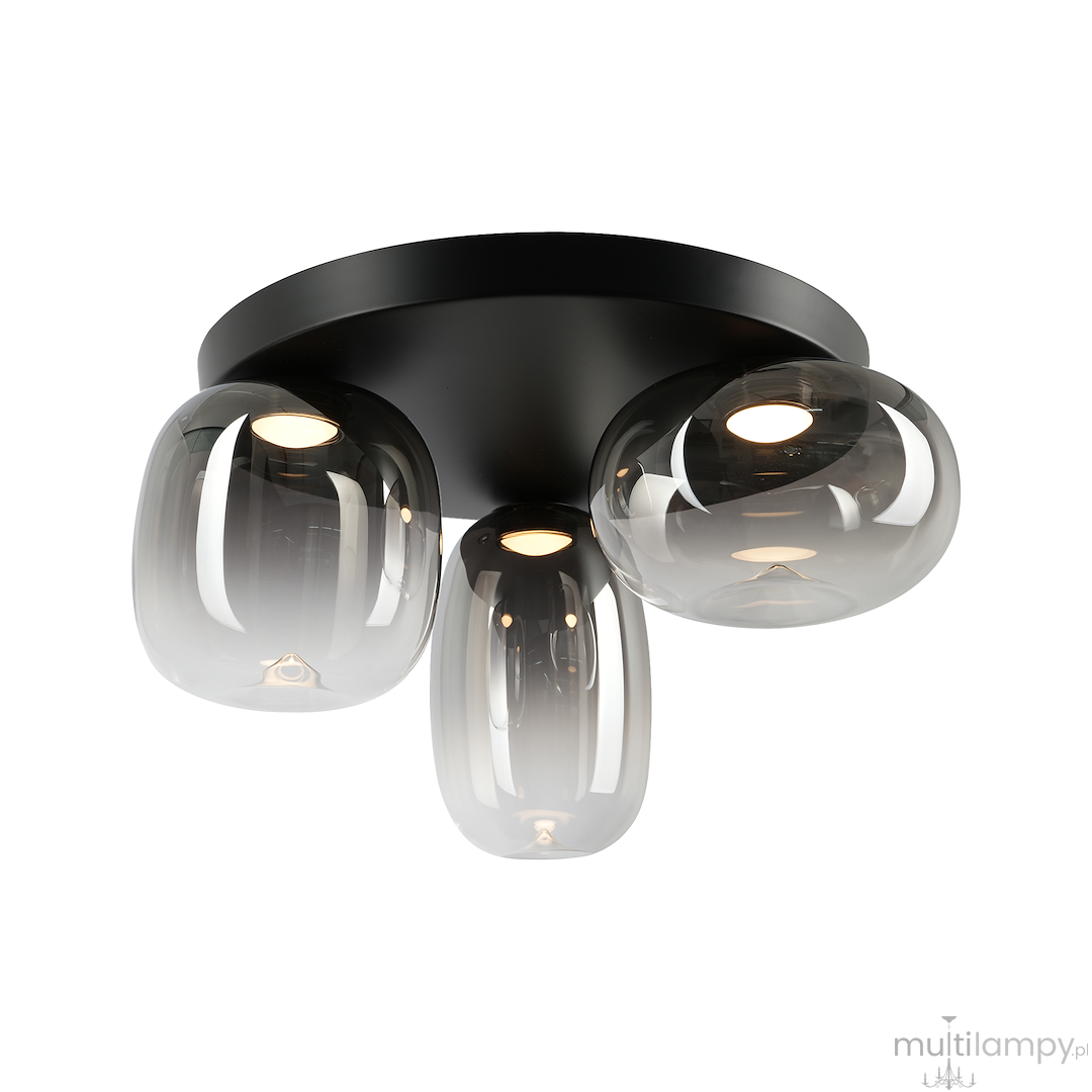 Lampa sufitowa LED Vaso 12W 3000K w kolorze czarnym, z trzema dymionymi kloszami. Montowana na płaskim, okrągłym stelażu. Klosze mają zaokrąglony kształt, emitując ciepłe światło. Idealna do nowoczesnych wnętrz.