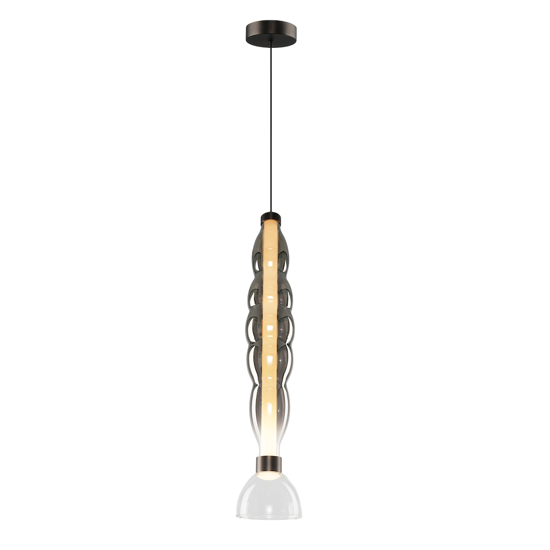 Lampa wisząca LED Lucco 18W 3000K w kolorze czarnym z dymionym kloszem. Produkt ma smukły kształt, zawieszony na cienkim przewodzie. U góry znajduje się czarna oprawa, a na dole przezroczysty klosz, który subtelnie rozprasza światło.