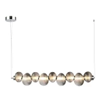 Lampa wisząca LED Bolla 32W 3000K w kolorze chromu i dymionego szkła, zawieszona na cienkich linkach. Składa się z ośmiu okrągłych, teksturowanych elementów. Sprawdzi się w nowoczesnych aranżacjach wnętrz.