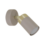 Kinkiet Joker w kolorze kaszmirowym z metalowym złotym wykończeniem. Okrągła podstawa i cylindryczny klosz, skierowany pod kątem, przeznaczony na żarówkę GU10. Prosty design, idealny do nowoczesnych wnętrz.