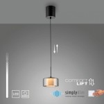Lampa wisząca LED Rika 6W w kolorze czarnym dymionym, z przezroczystym kloszem. Zawieszona na cienkim, czarnym przewodzie. Widoczne ikony funkcji dimmera i regulacji wysokości. Minimalistyczny design, idealna do nowoczesnych wnętrz.