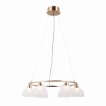 Lampa wisząca Montiela z sześcioma źródłami LED 30W, w złotej oprawie. Posiada okrągły metalowy stelaż z przezroczystymi, półkulistymi kloszami. Zawieszona na cienkich linkach, z widocznym przewodem. Prosta forma, idealna do nowoczesnych wnętrz.