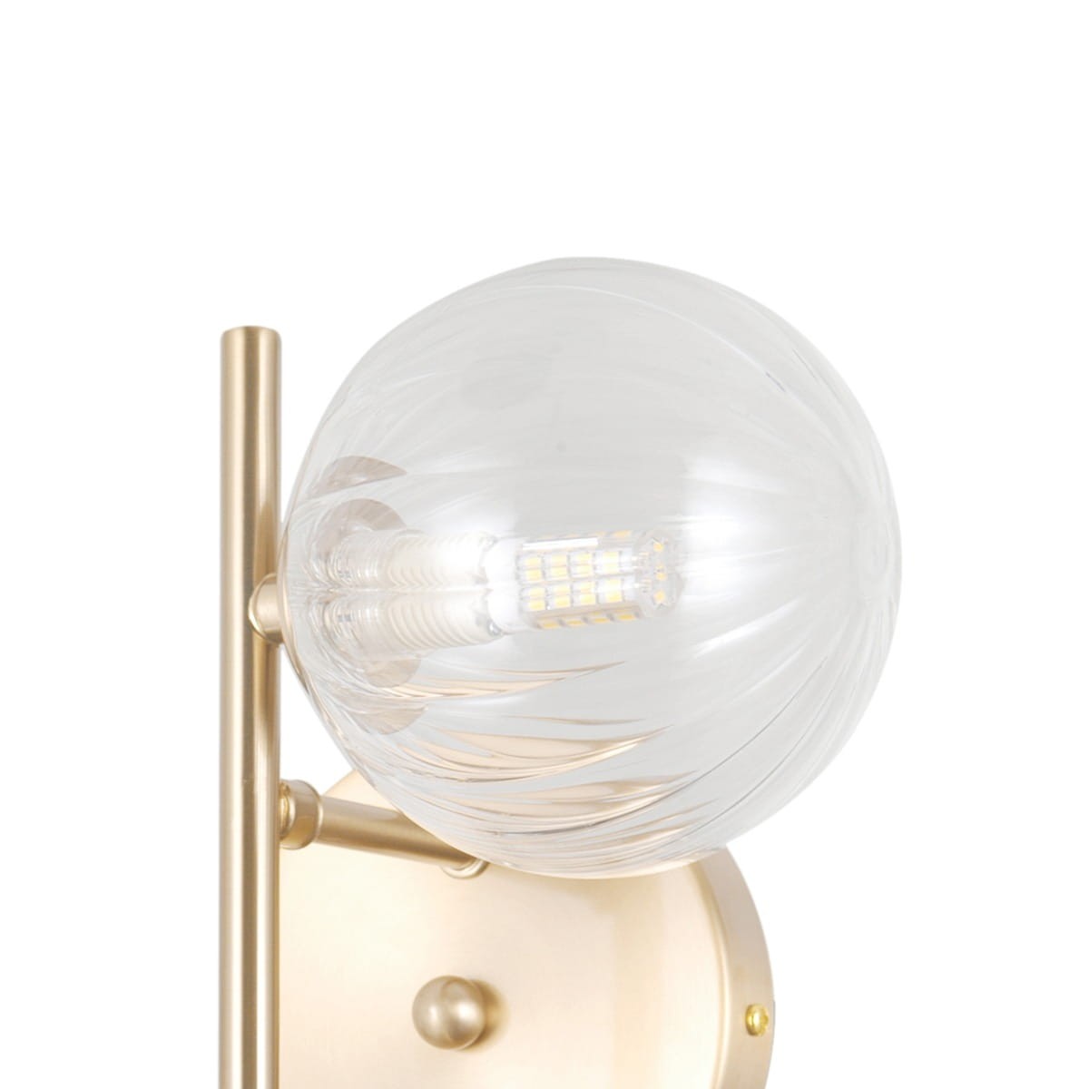 Kinkiet Toledo 2xG9 w kolorze złotym, z przezroczystą, okrągłą kloszem o teksturowanej powierzchni. Umożliwia montaż na ścianie, z widocznym źródłem światła LED wewnątrz klosza. Prosty, elegancki design.