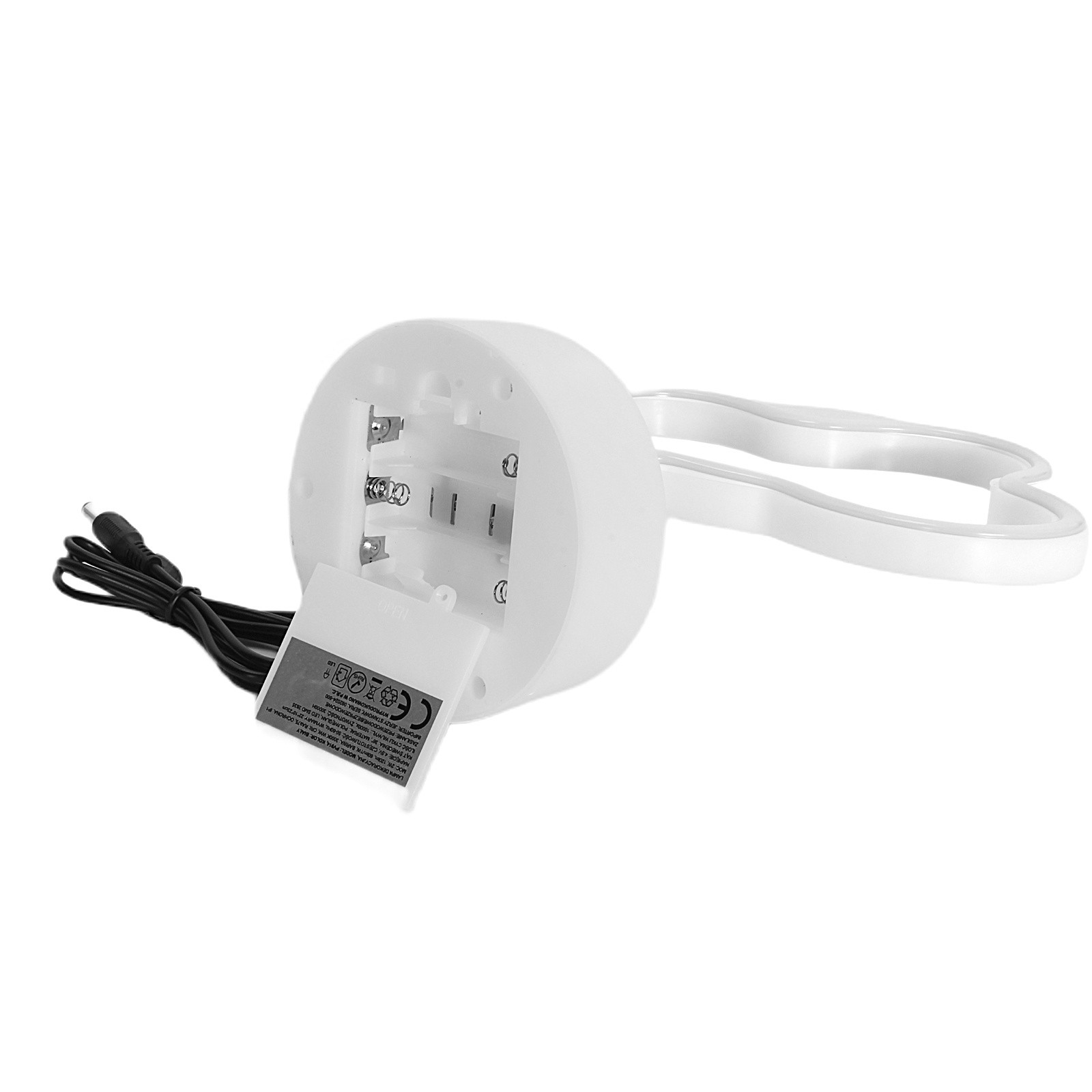 Królik lampka nocna LED 2W w białym kolorze, z okrągłą podstawą i uszami w kształcie serca. Widoczny kabel zasilający, miejsce na baterie. Produkt leży na płaskiej powierzchni, ukazując tylną część z gniazdami.