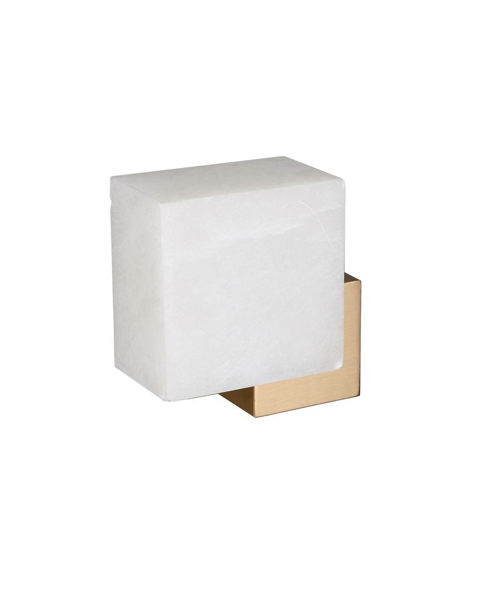 Kinkiet LED Cubo 3W 3000K w kolorze złotym, z białą, prostokątną obudową. Produkt stoi na kwadratowej podstawie. Widoczny jest detal złotego akcentu, który dodaje elegancji. Tło proste, jednolite.