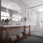 Lampa wisząca LED D60 o mocy 35W w złotym kolorze, zamontowana nad lustrem w łazience. Widoczna na tle marmurowych płytek, z białą umywalką i drewnianą półką. W tle rośliny doniczkowe i ręczniki.
