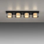 Lampa sufitowa Rika z czterema punktami świetlnymi LED, moc 26W. Czarny, dymiony klosz z przezroczystymi elementami. Ujęcie frontalne, montowana na suficie, dostarczająca nowoczesne oświetlenie.