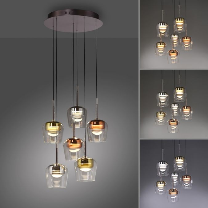 Lampa wisząca Q-kon z pilotem, z sześcioma kloszami LED 36W w kolorze złotym, miedzianym i przezroczystym. Wisząca konstrukcja z metalowym stelażem, w różnych konfiguracjach, idealna do nowoczesnych wnętrz.