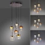 Lampa wisząca Q-kon z pilotem, z sześcioma kloszami LED 36W w kolorze złotym, miedzianym i przezroczystym. Wisząca konstrukcja z metalowym stelażem, w różnych konfiguracjach, idealna do nowoczesnych wnętrz.