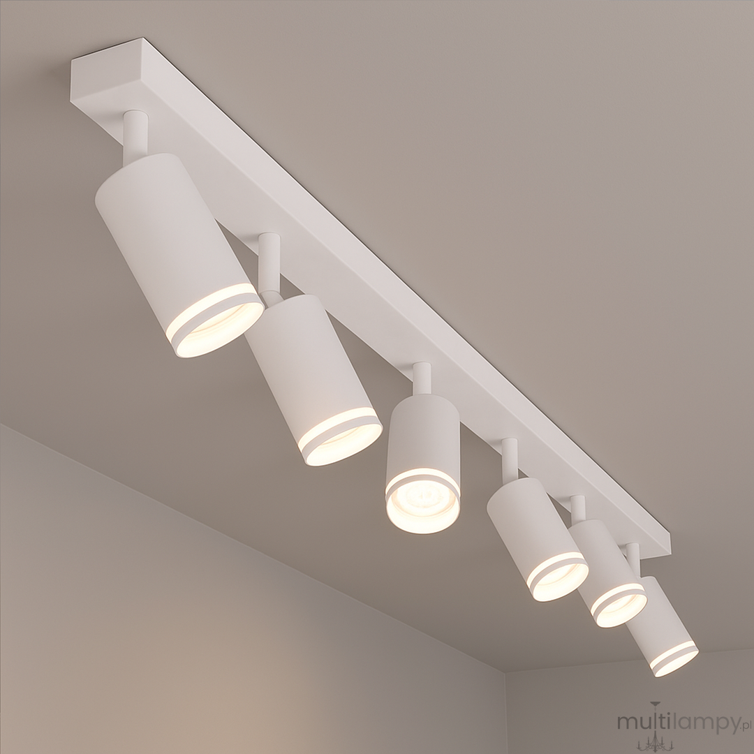Lampa sufitowa Pipe Ring z sześcioma reflektorami GU10 w kolorze białym, zamontowana na prostokątnej podstawie. Reflektory mają cylindryczny kształt i są skierowane w różne strony, co umożliwia regulację oświetlenia.