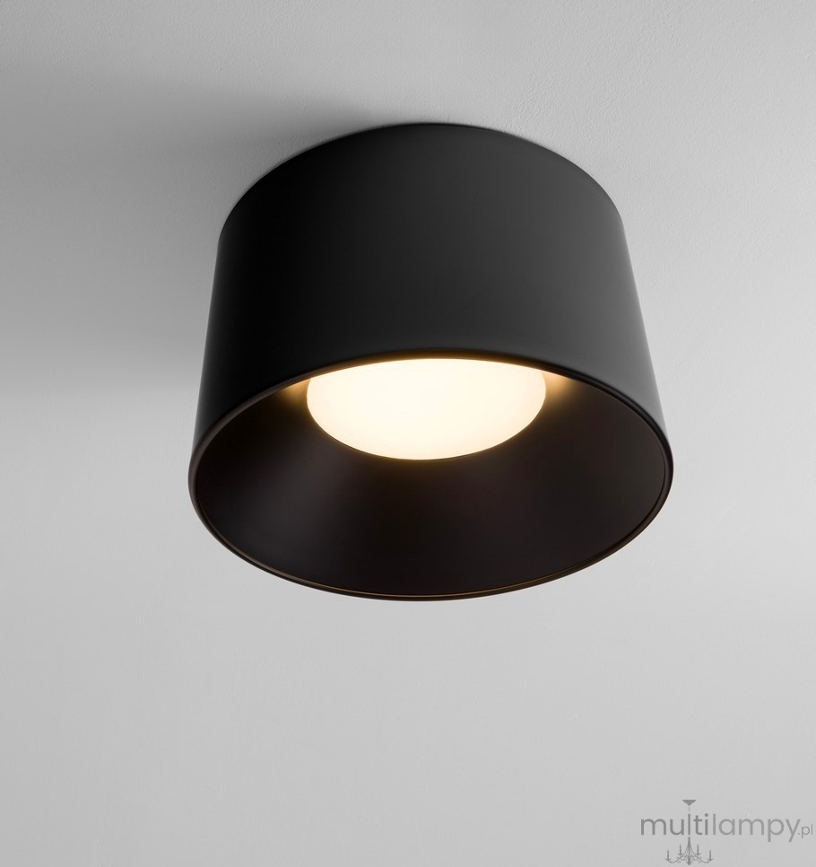 Lampa sufitowa Bajo LED 35W w kolorze czarnym, o cylindrycznym kształcie. Widok z dołu, ukazujący białą oprawę świetlną w środku. Montowana na suficie, minimalistyczny design bez dodatkowych dekoracji.