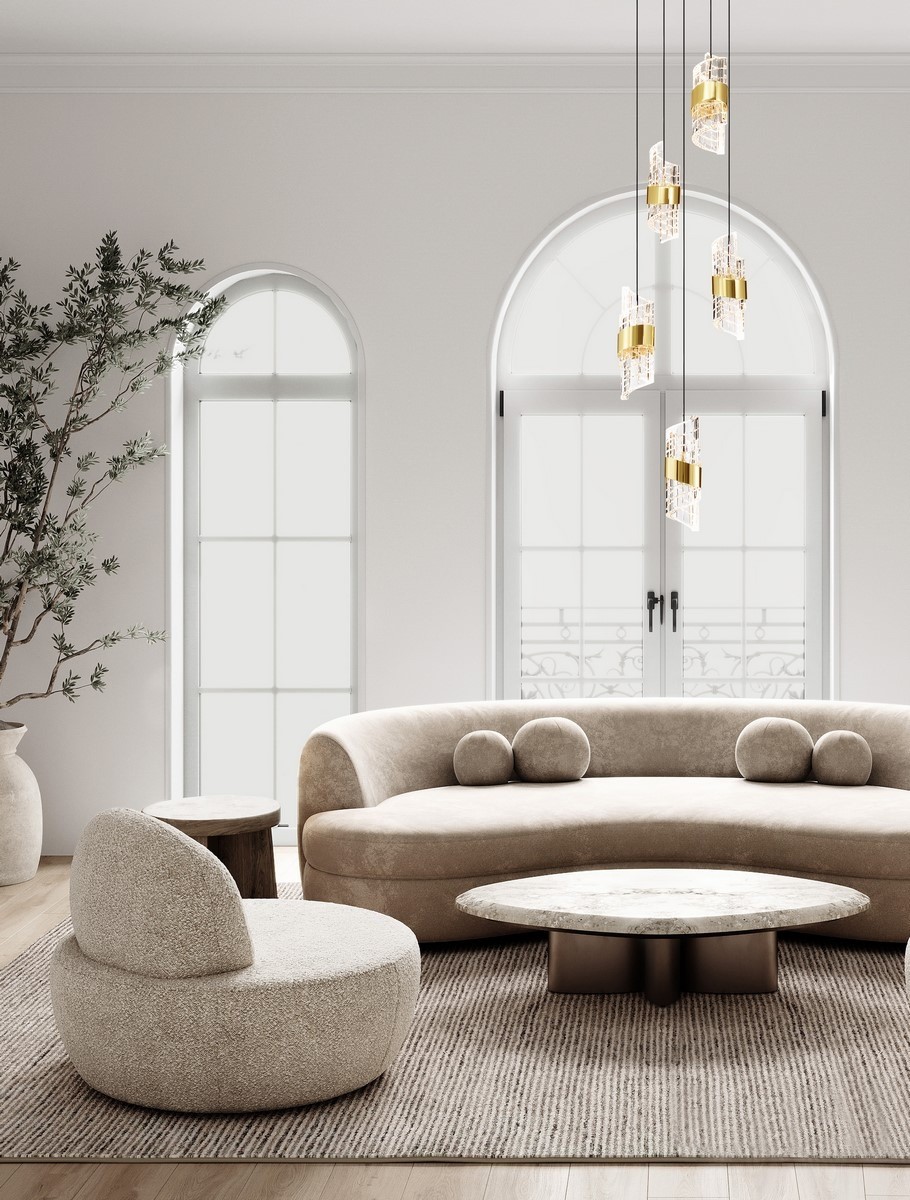 Lampa wisząca Paita z pięcioma źródłami LED o mocy 41W, w kolorze czarnym, z przezroczystymi kloszami i złotymi detalami, zawieszona w nowoczesnym wnętrzu z jasnymi ścianami i minimalistycznym umeblowaniem.